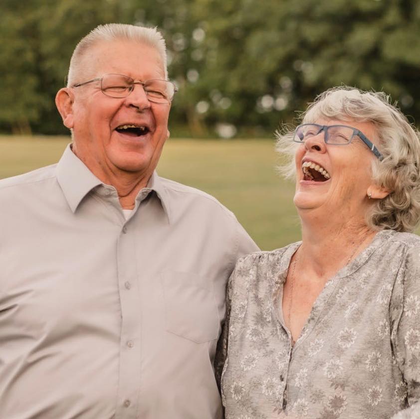 Older couple expressing joy
